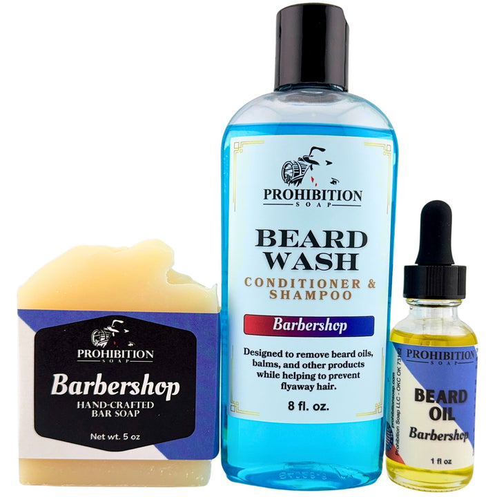 Prohibition Soap Barbershop grooming products including soap, beard wash, and beard oil on a white background.