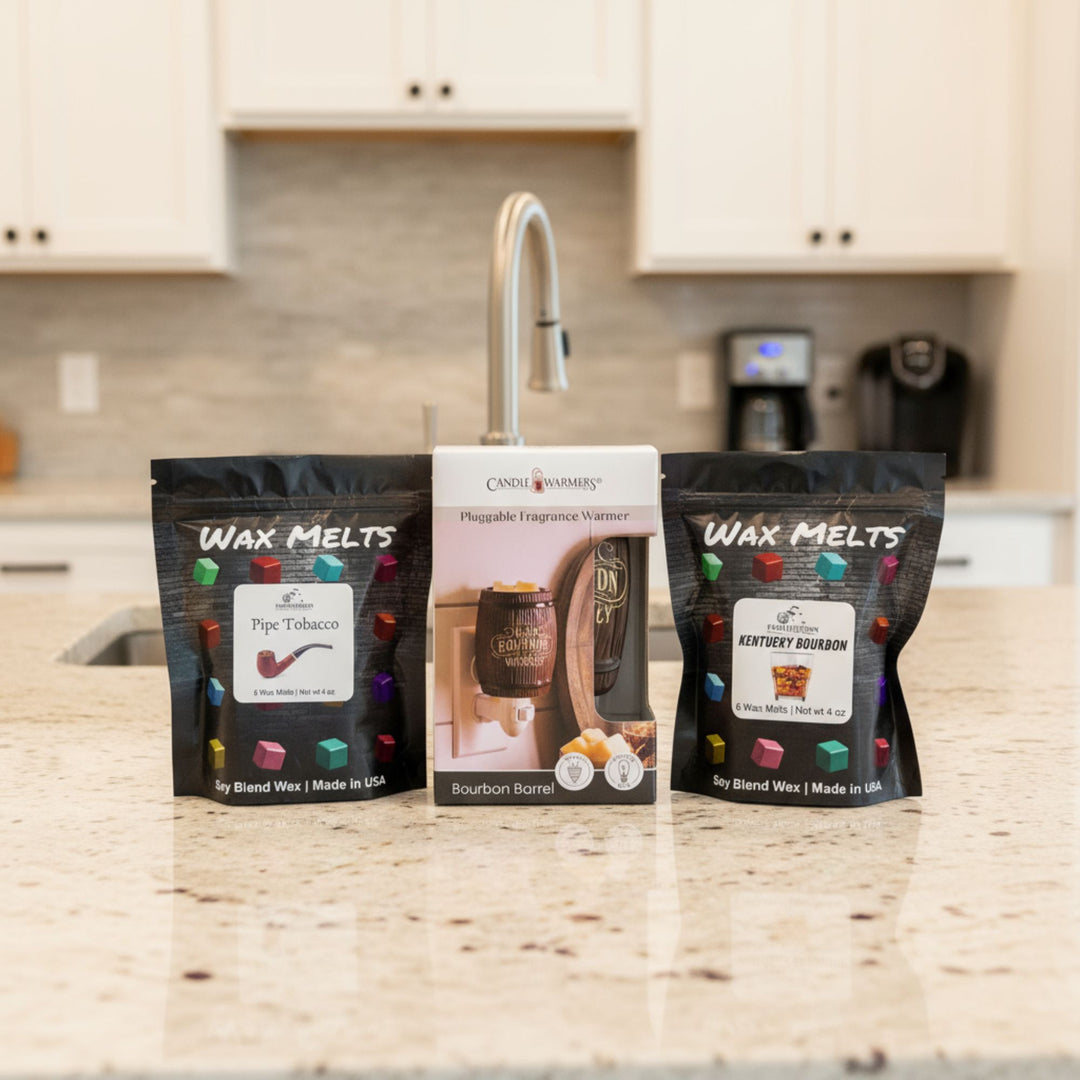 Two packages of wax melts with a fragrance warmer on a kitchen counter with a blurred background