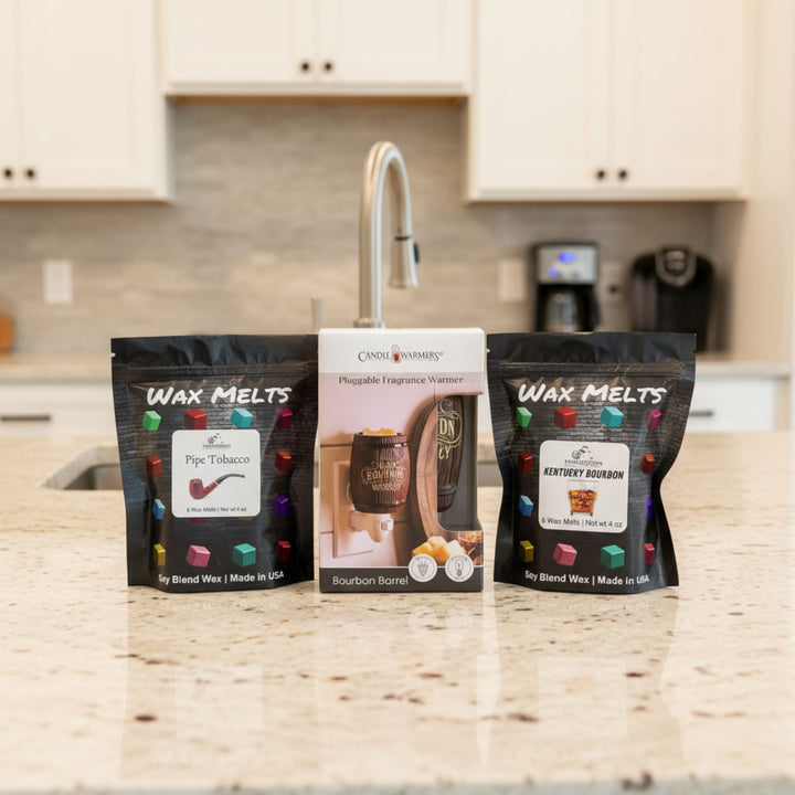 Two packages of wax melts with a fragrance warmer on a kitchen counter with a blurred background