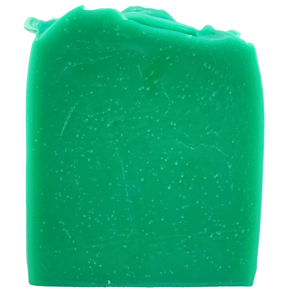 Green soap bar with a textured surface on a white background