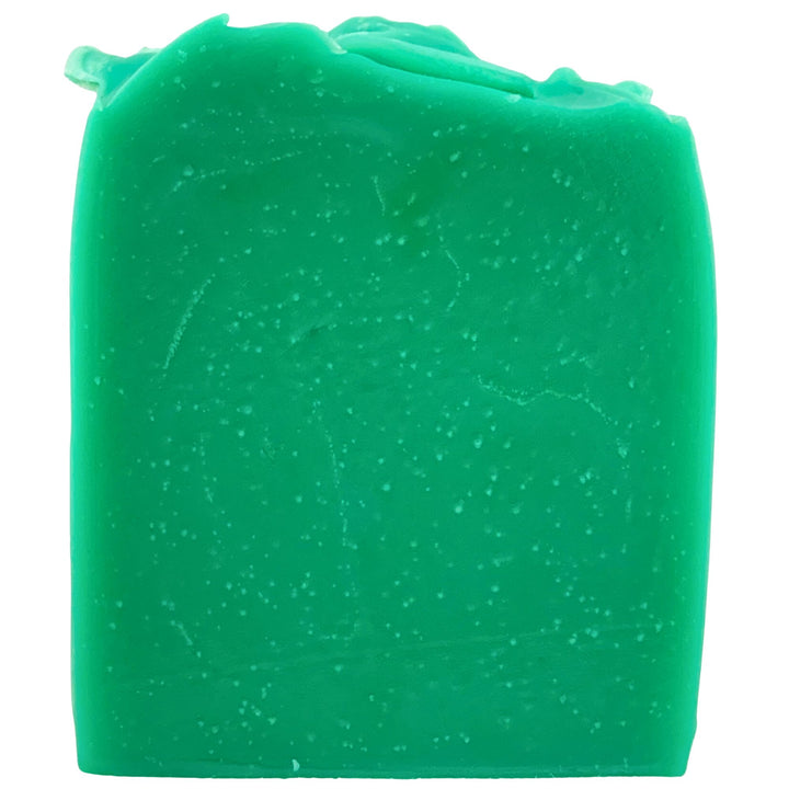 Green soap bar with a textured surface on a white background