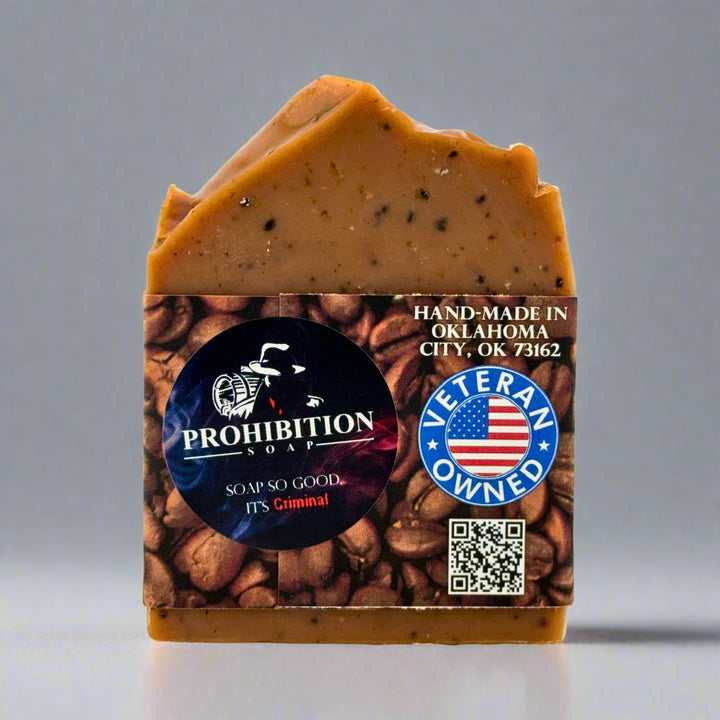 Bar of soap with a Prohibition Soap label on a gray background