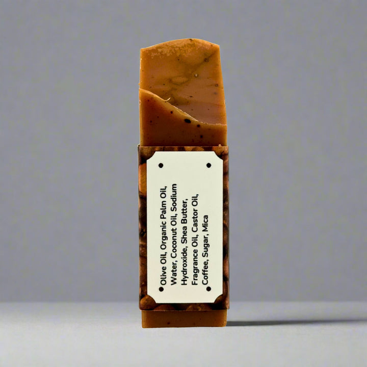 Bar of soap with a label on a gray background