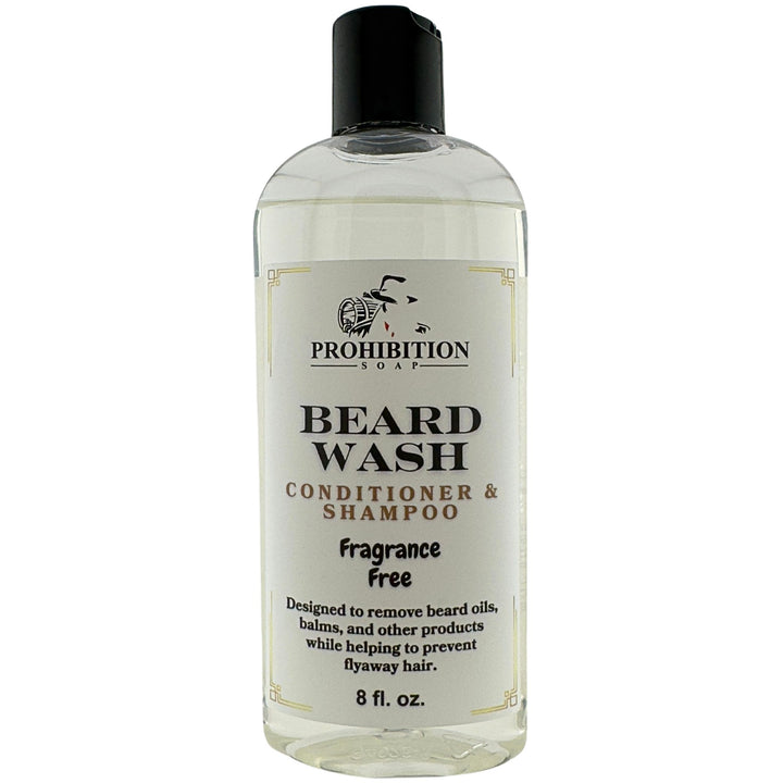 Prohibition Soap Fragrance Free Beard Wash conditioner and shampoo in clear 8 fl oz bottle with clear liquid on white background, showing front label with product benefits including removing beard oils, balms and other products while preventing flyaway hair
