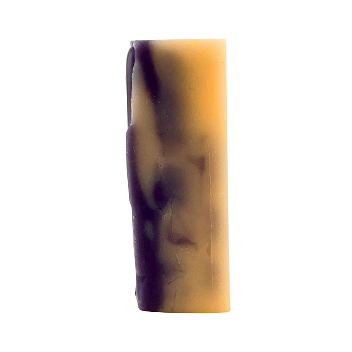 Purple and orange soap on a white background