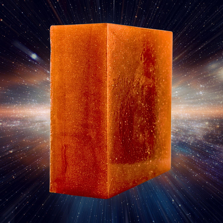 Orange soap with a starry space background