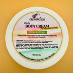 Prohibition Soap Daily Body Cream label showing Citrus and Sage scent with complete ingredients list including jojoba oil, aloe vera, and vitamin E, featuring colorful gradient design and product directions on golden background