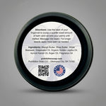 Black container with white label featuring directions and ingredients on a gray background