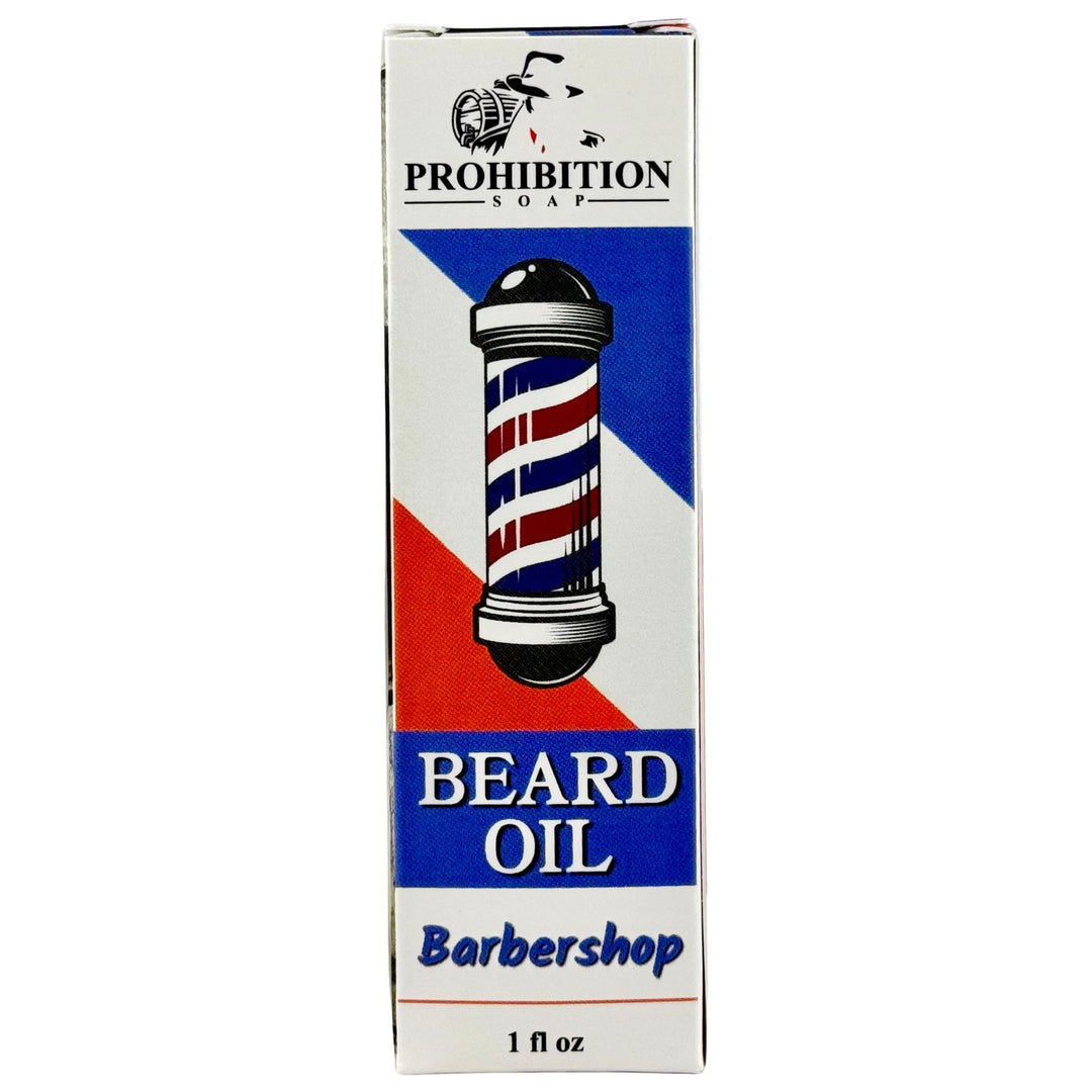 Box of Prohibition Soap beard oil with a barber pole design on a white background