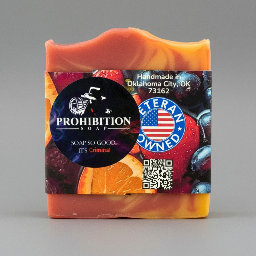 Bar of soap with a colorful label featuring the Prohibition Soap brand on a gray background.