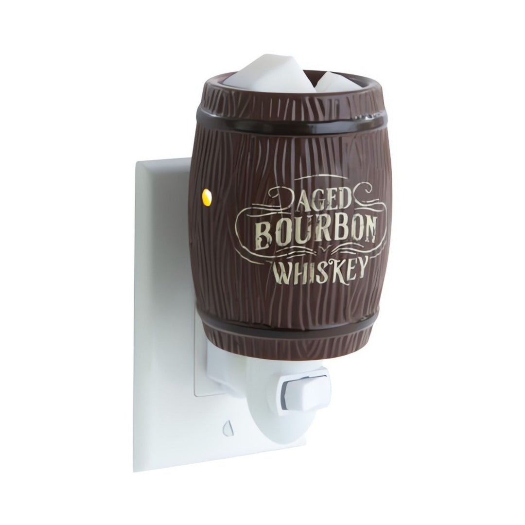 Wall-mounted fragrance warmer with 'Aged Bourbon Whiskey' design on a white background