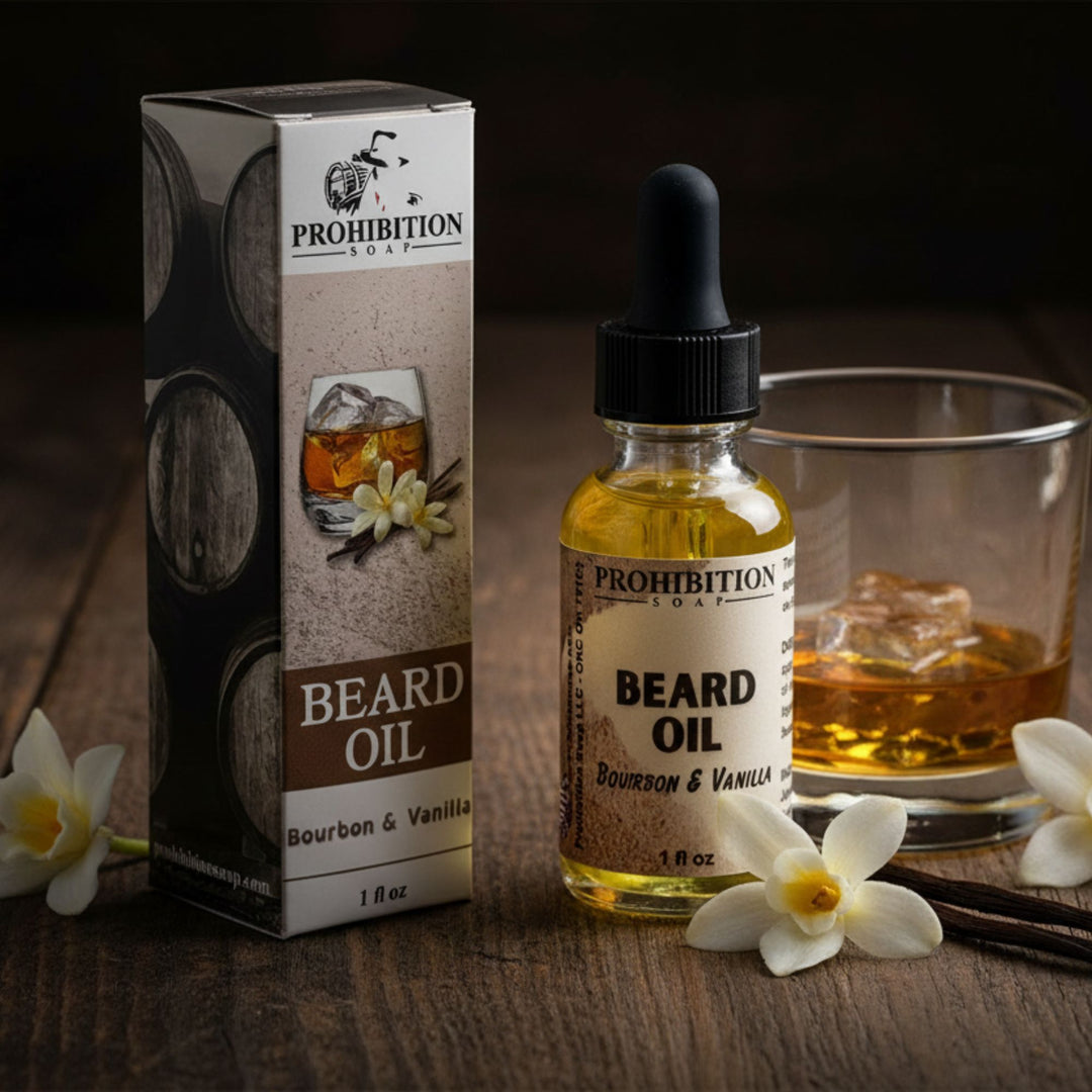 Prohibition Soap beard oil bottle and packaging on a wooden surface with flowers and a glass of liquid.