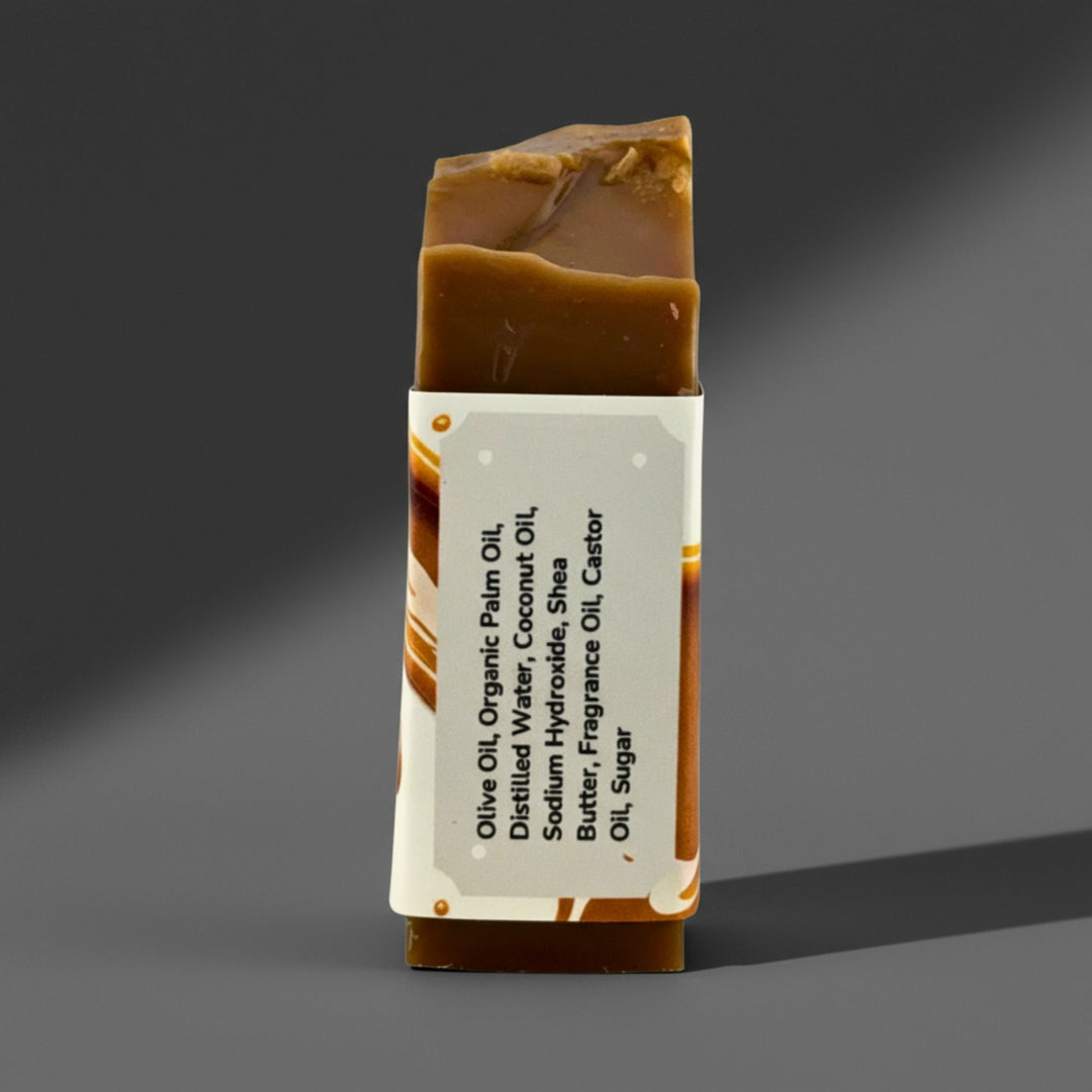 Bar of soap with a label on a gray background