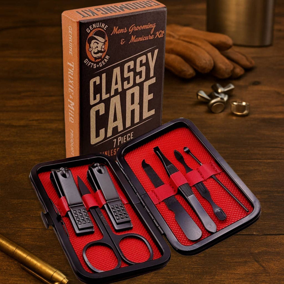 Man's grooming kit with tools and branded box on a wooden surface
