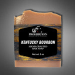 Front view of Kentucky Bourbon bar soap with the Prohibition Soap label clearly showing the name, hand-crafted designation, and 5 oz net weight on a gray background