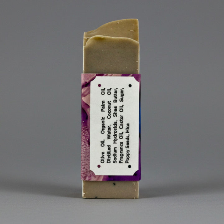 Bar of soap with a label on a gray background