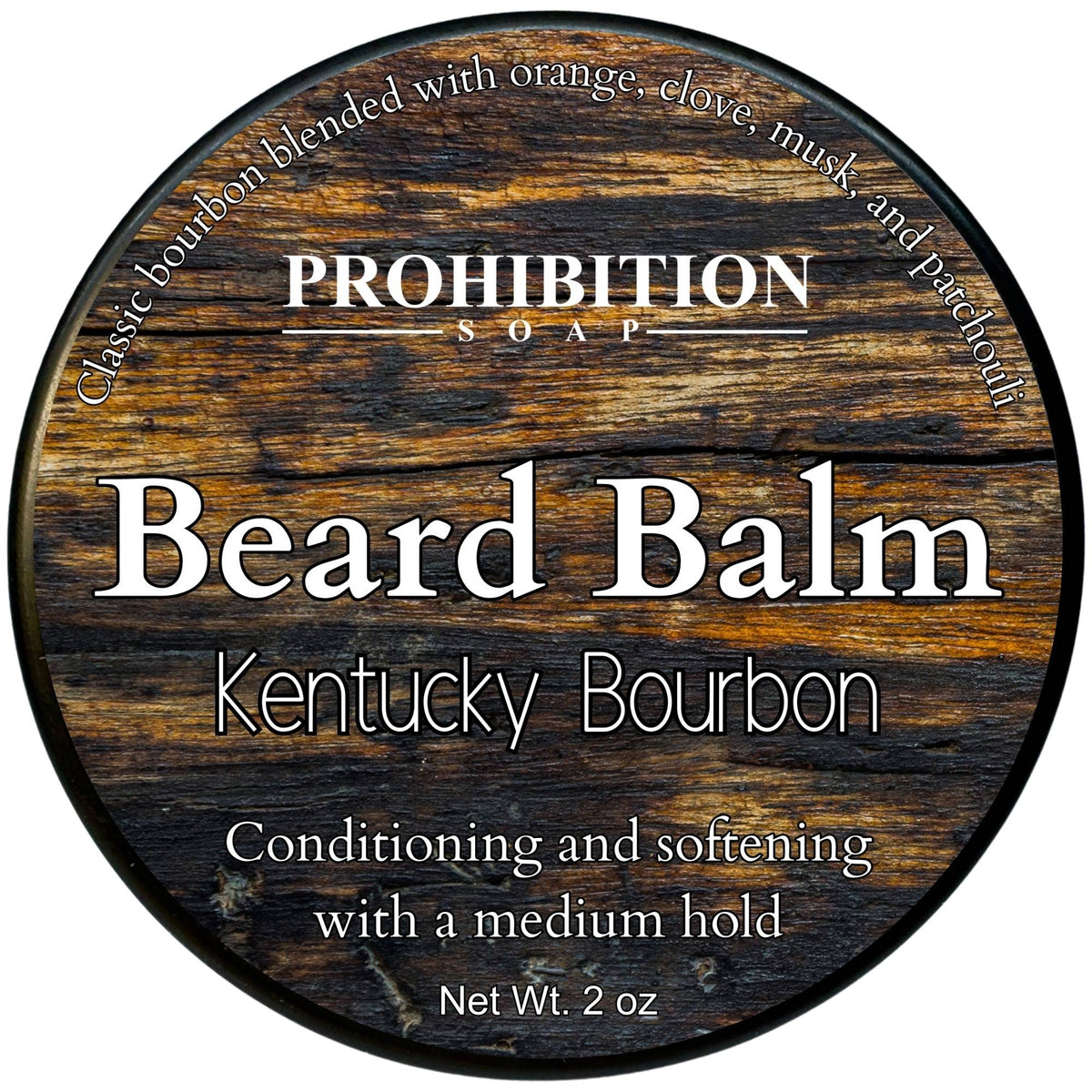 Circular container of Kentucky Bourbon Beard Balm with a wooden background design. The brand 'Prohibition Soap' is displayed at the top and the product name 'Beard Balm' is repeated along with 'Kentucky Bourbon' and a description.