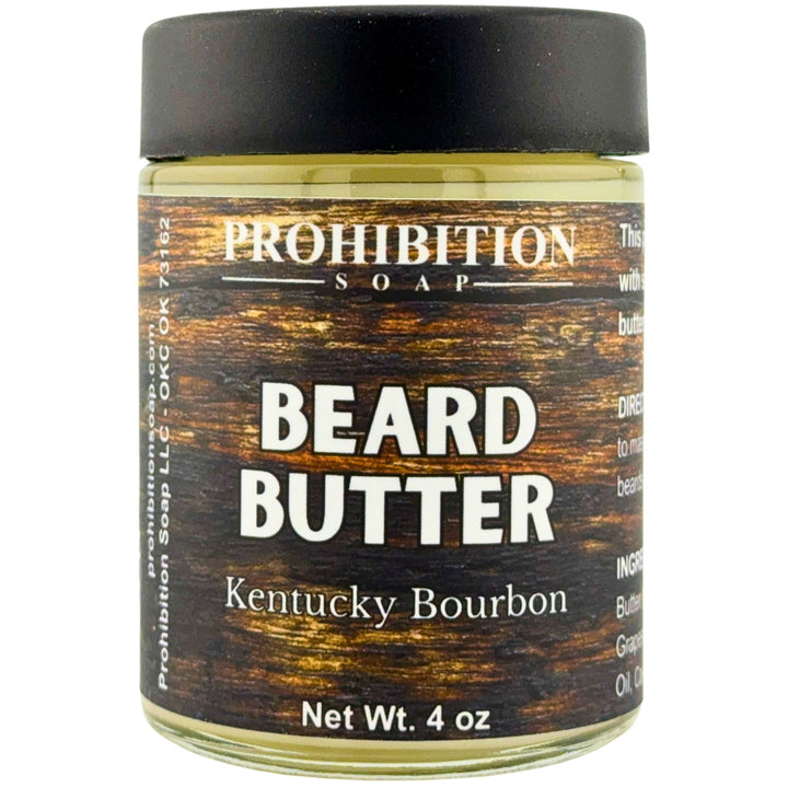 Prohibition Soap Beard Butter in Kentucky Bourbon scent - 4 oz glass jar with black lid showing rich wood grain textured label design and product information including directions and ingredients