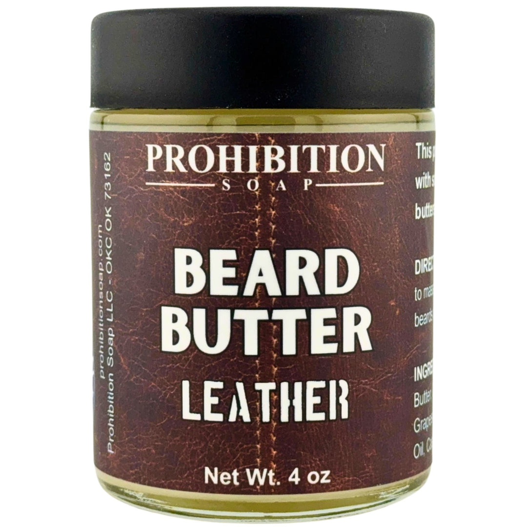 Prohibition Soap Beard Butter in Leather scent - 4 oz glass jar with black lid showing rich brown leather-textured label design and product information including directions and ingredients