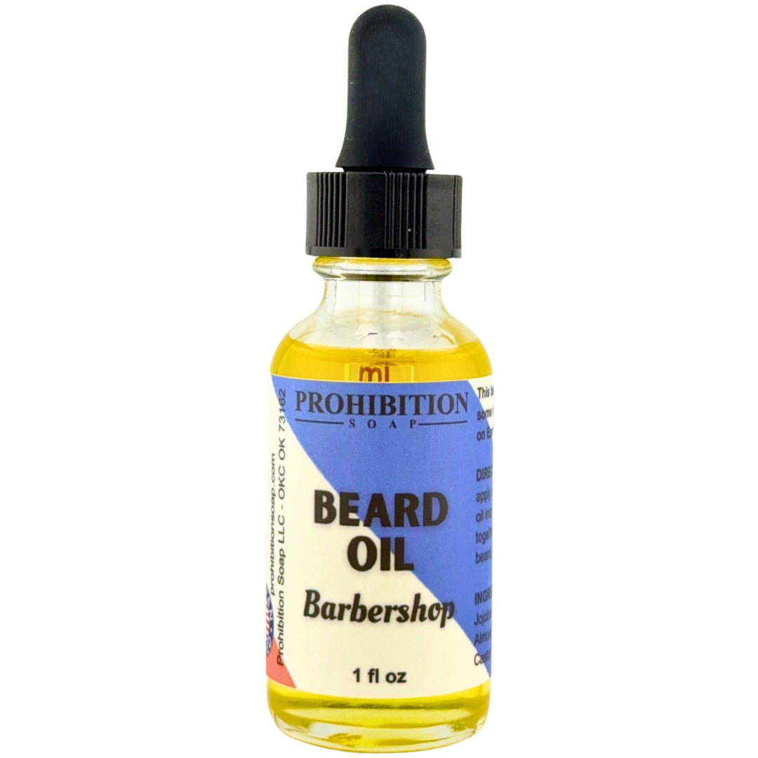 Bottle of Prohibition Soap beard oil with a dropper on a white background
