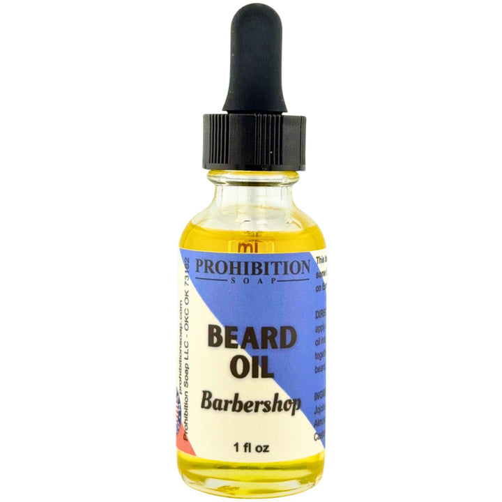 Bottle of Prohibition Soap beard oil with a dropper on a white background