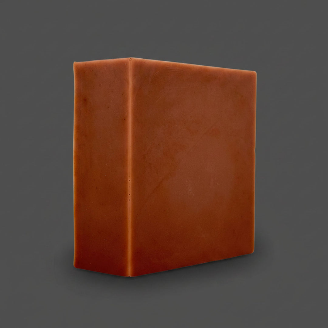 Brown soap on a grey background
