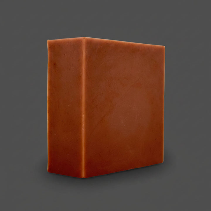 Brown soap on a grey background