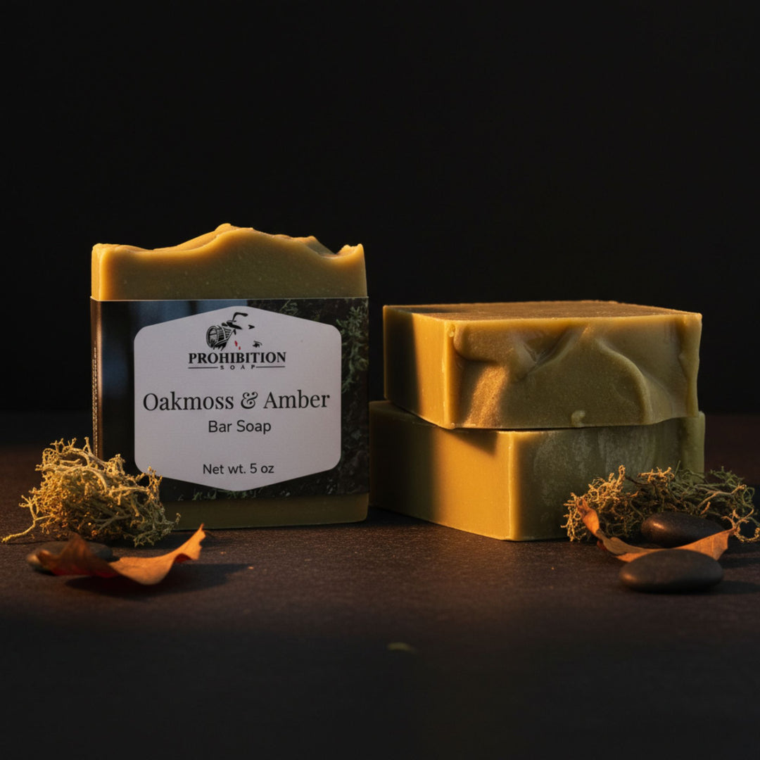 Two bars of soap with a label on a dark background