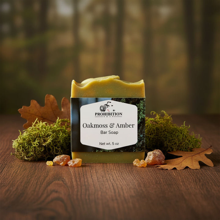 Bar of soap with 'Prohibition Art' label on a wooden surface with natural elements