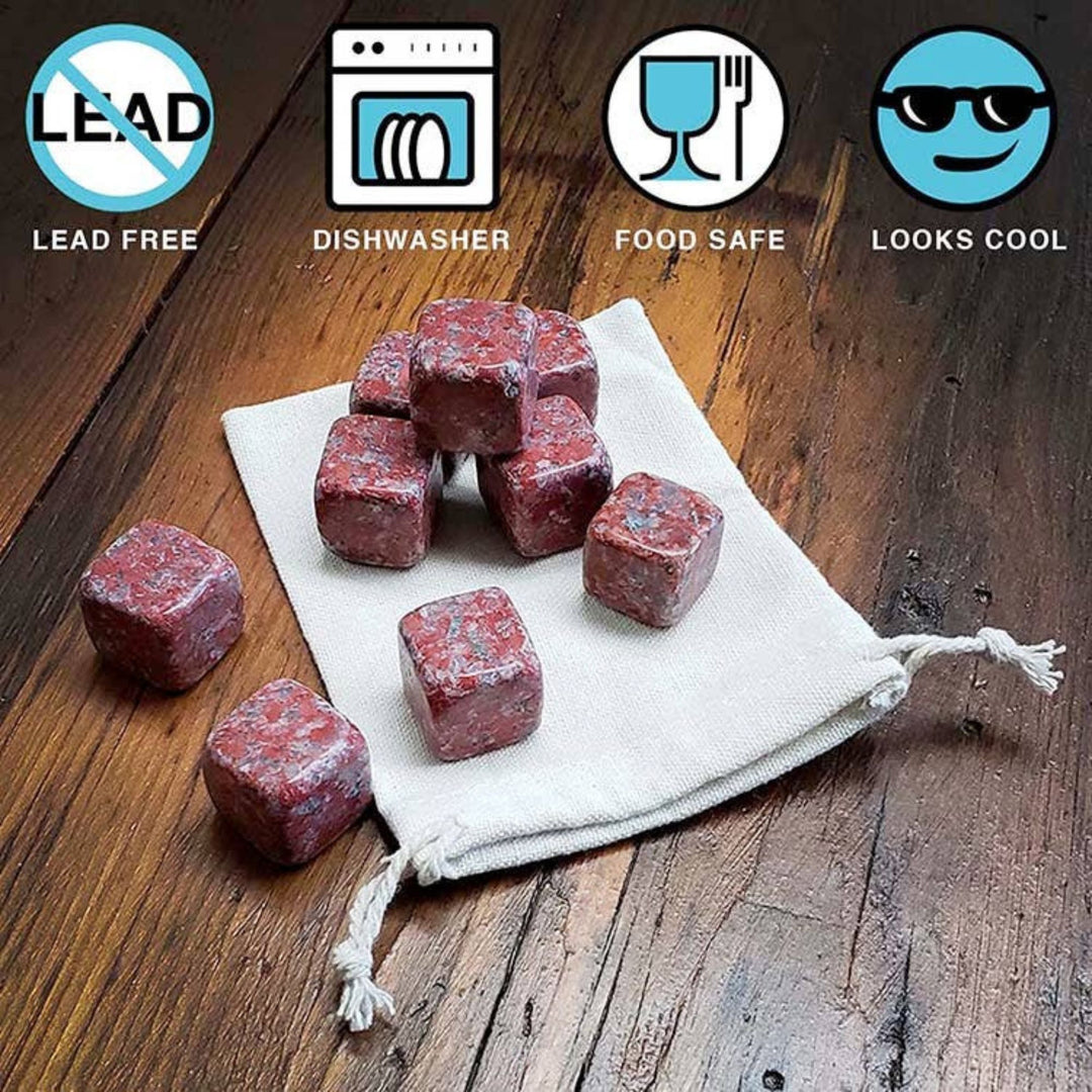 Red stone-like cubes on a white cloth with certification icons for lead-free, dishwasher safe, food safe, and looks cool on a wooden background.