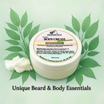Prohibition Soap Daily Body Cream with Citrus and Sage scent surrounded by natural green leaves and cream dollop on soft green background with 'Unique Beard & Body Essentials' tagline, showcasing natural yogurt-based formula