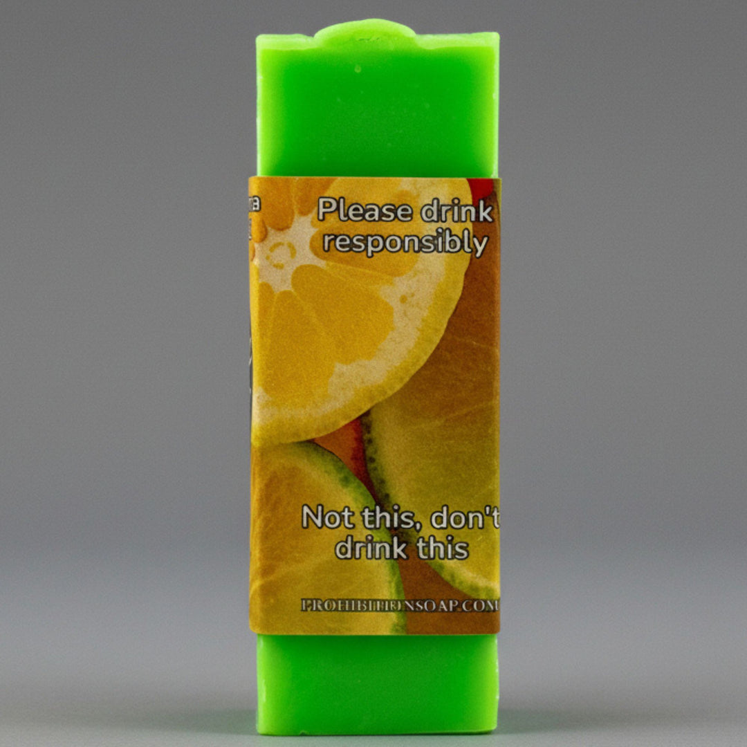 Green soap bar with a humorous label on a gray background