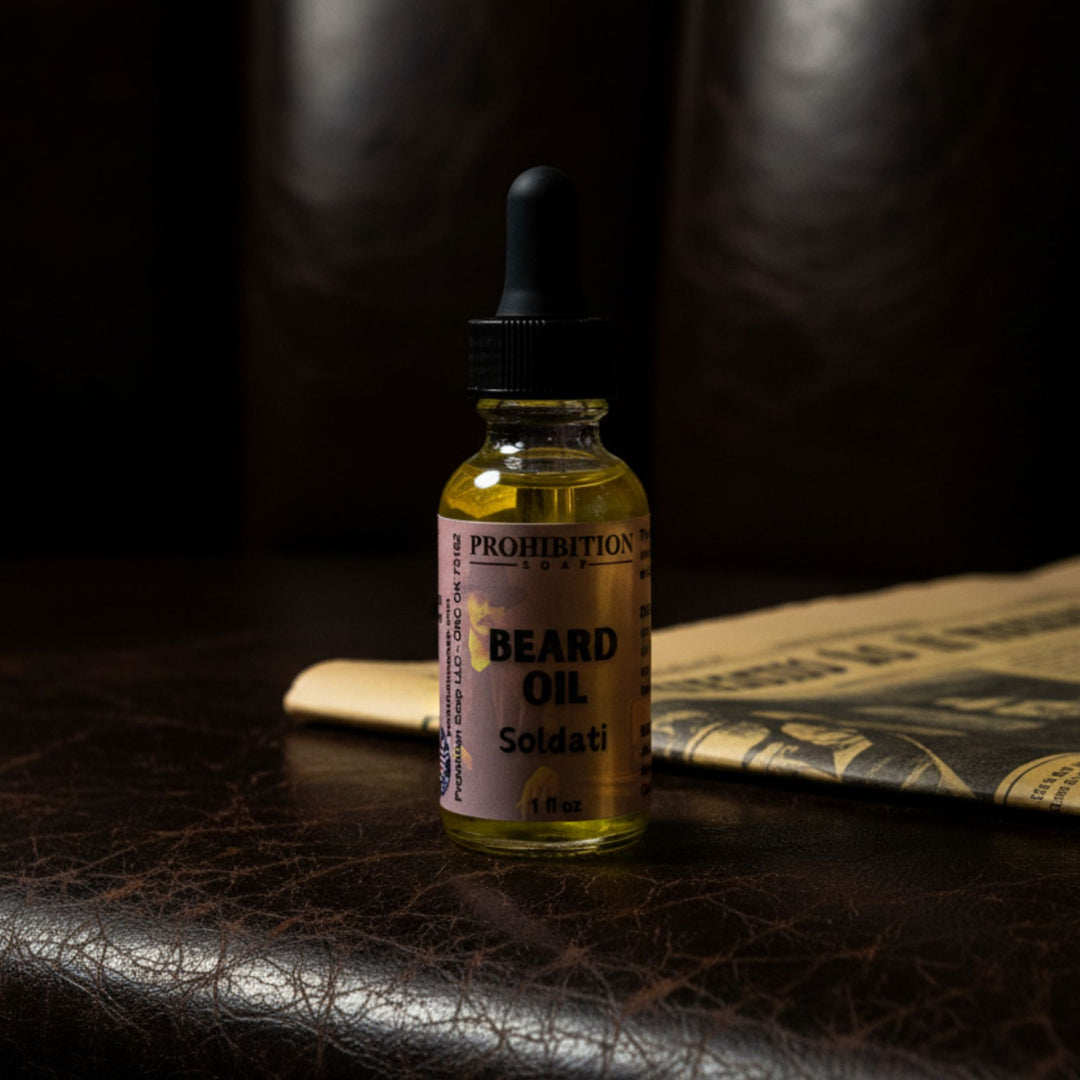 Bottle of Prohibition Soldati Beard Oil on a dark surface with a newspaper.