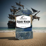 Bar of soap labeled 'Squid Wash' with a ship in the background on a beach.